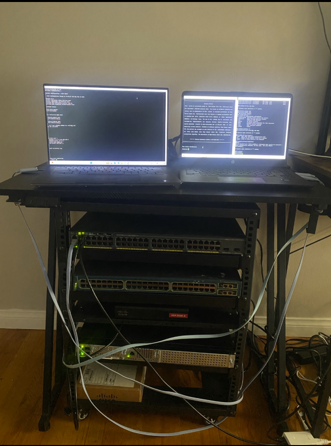Physical Cisco rack: router, ASA firewall, and switches